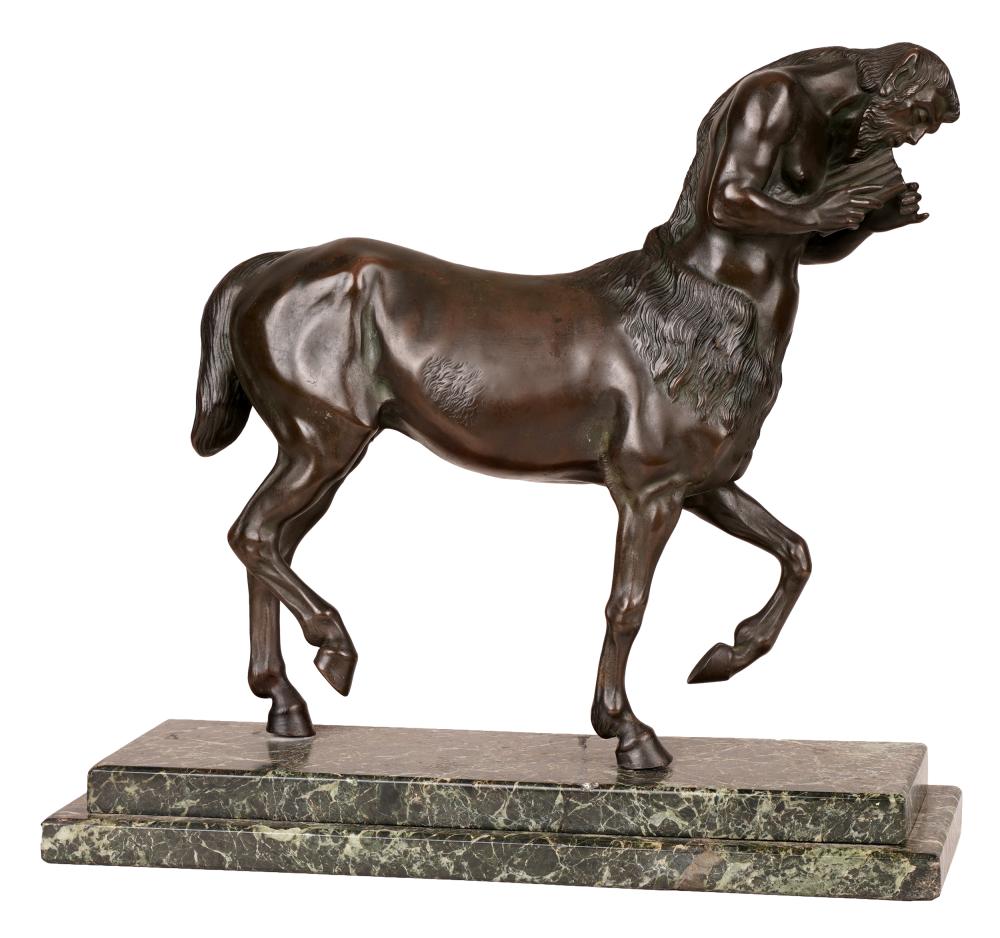 PATINATED BRONZE FIGURE OF A