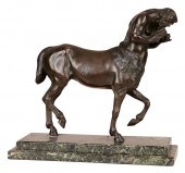 PATINATED BRONZE FIGURE OF A C