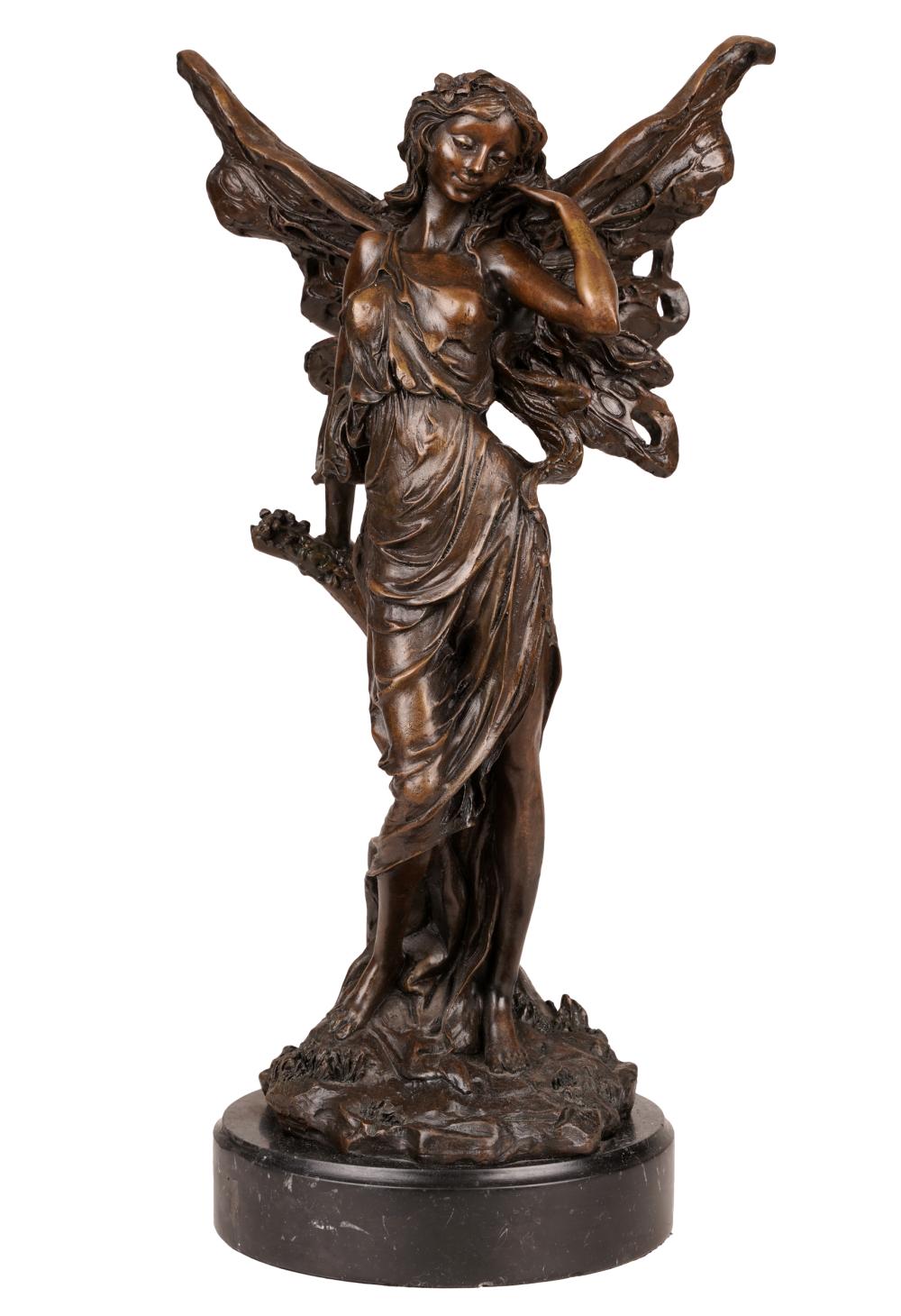 PATINATED BRONZE FIGURE OF A