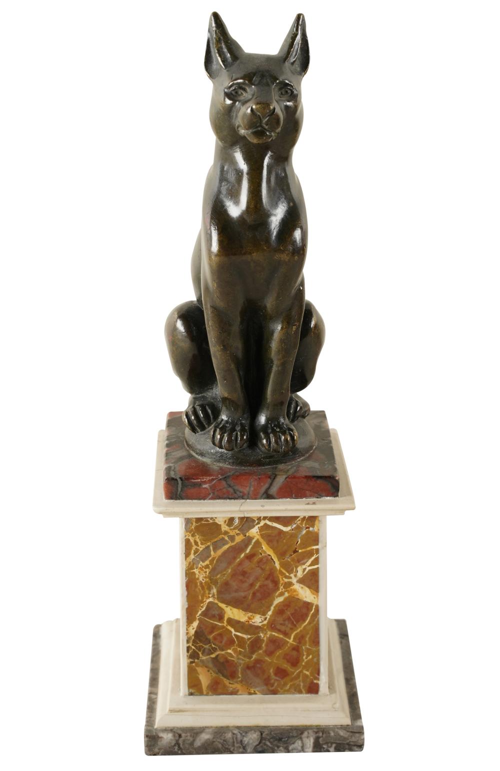 PATINATED BRONZE FIGURE OF A