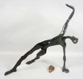 PATINATED BRONZE FIGURE OF A M