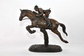 PATINATED BRONZE OF A JUMPING