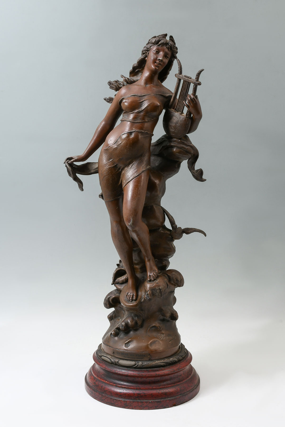 PATINATED BRONZE WOMAN WITH HARP