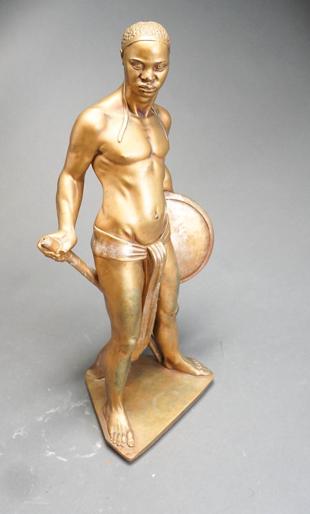 PATINATED COMPOSITION FIGURE OF A