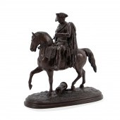 PATINATED EQUESTRIAN FIGURE OF