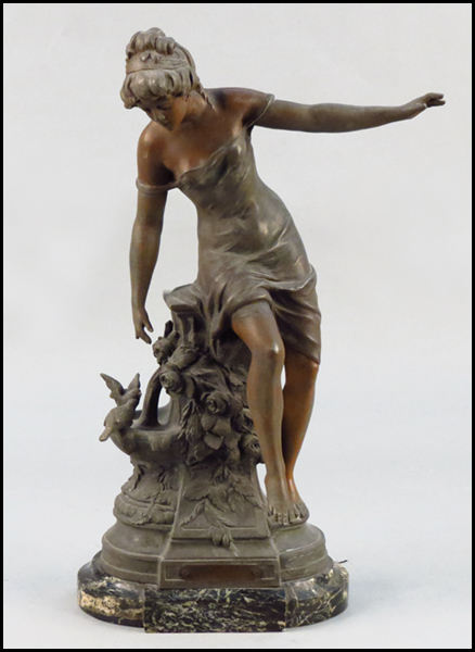 PATINATED METAL FIGURE OF A