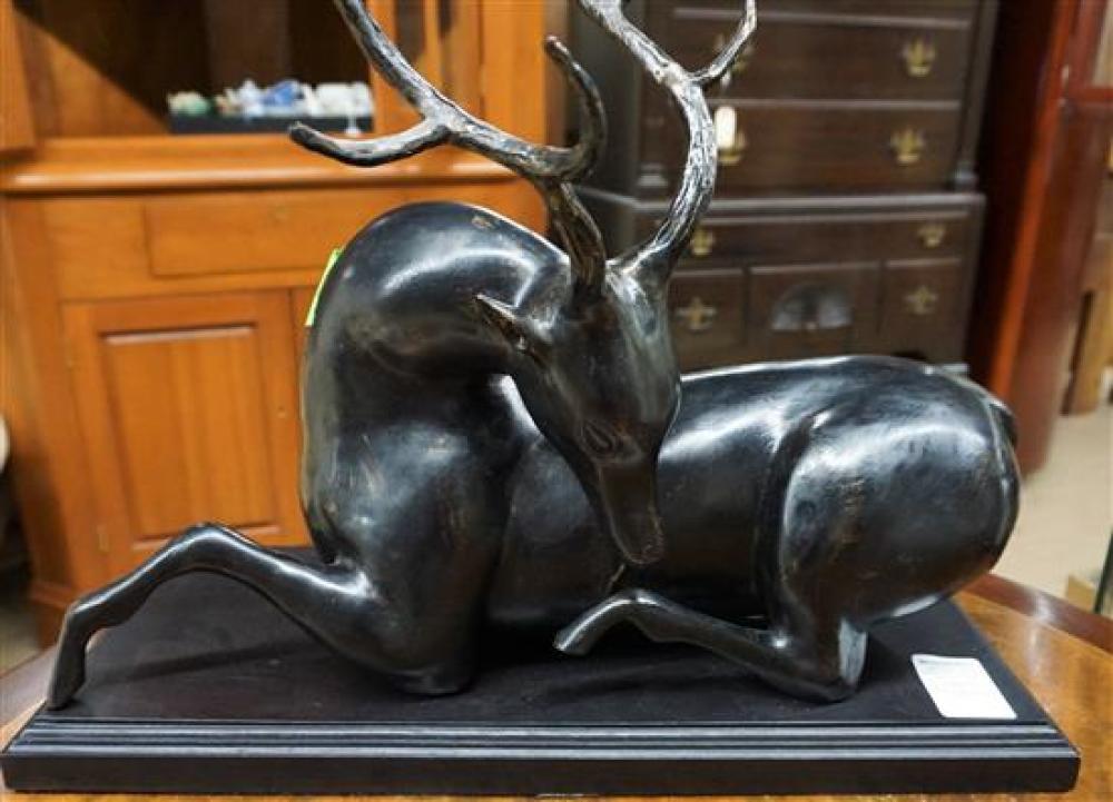 PATINATED METAL FIGURE OF A