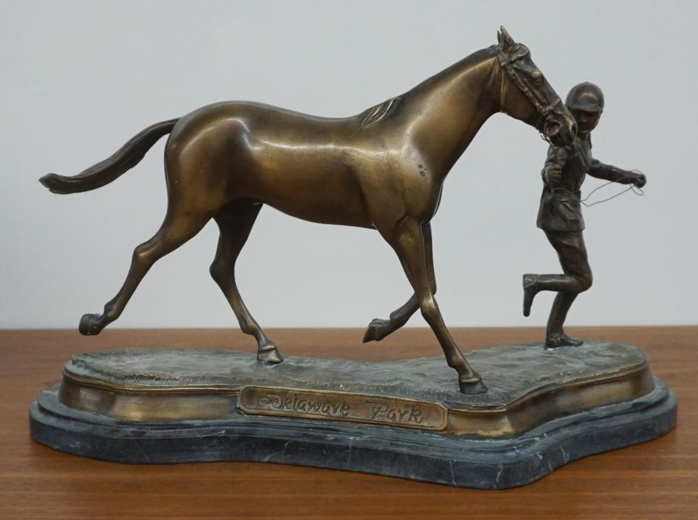 PATINATED METAL FIGURE OF JOCKEY
