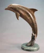 PATINATED METAL FIGURE OF LEAP