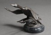 PATINATED METAL GOOSE IN FLIGH