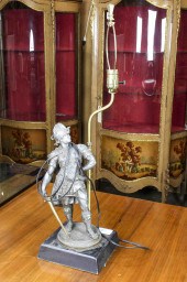 PATINATED METAL LAMP DEPICTING