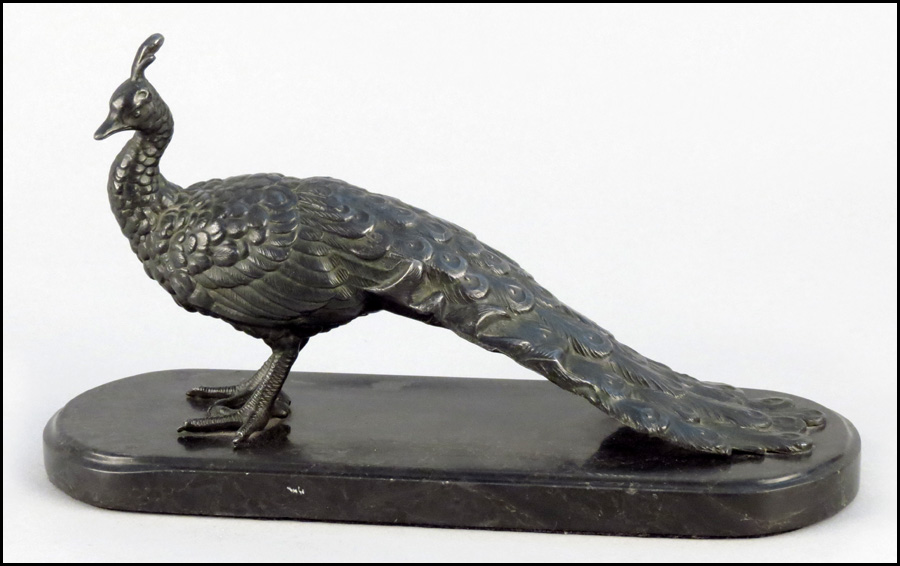 PATINATED METAL PEACOCK. Raised