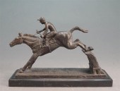 PATINATED METAL SCULPTURE OF R