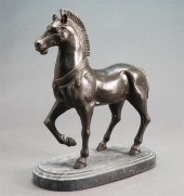 PATINATED METAL SCULPTURE OF S