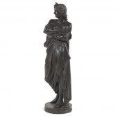 PATINATED METAL SCULPTURE OF V