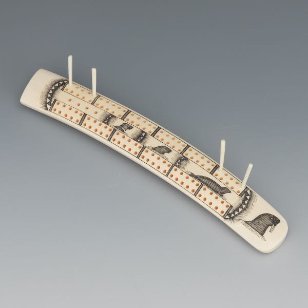 PAUL TIULANA CARVED SCRIMSHAW