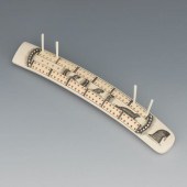 PAUL TIULANA CARVED SCRIMSHAW