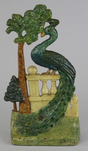 PEACOCK ON FENCE DOORSTOP