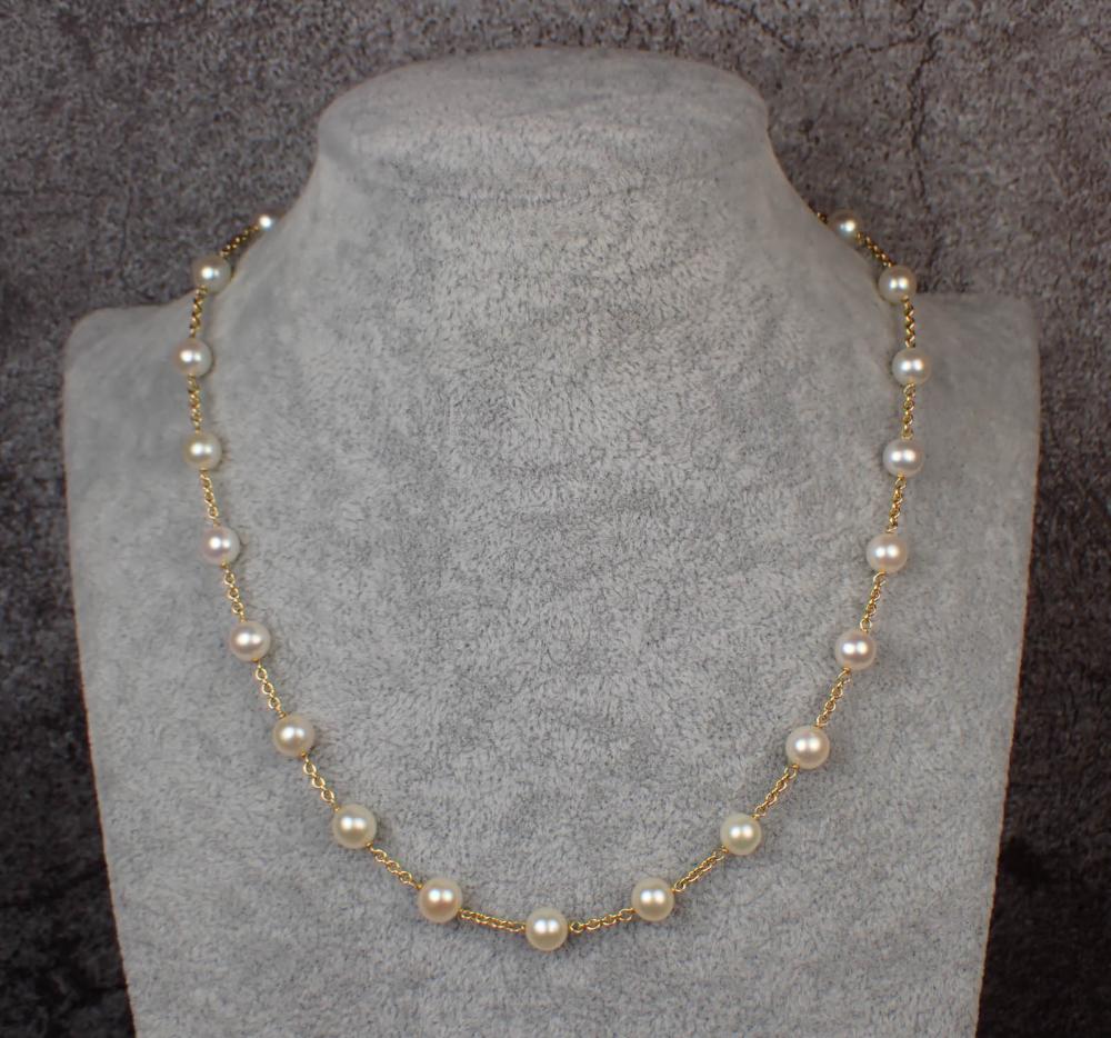 PEARL AND EIGHTEEN KARAT GOLD