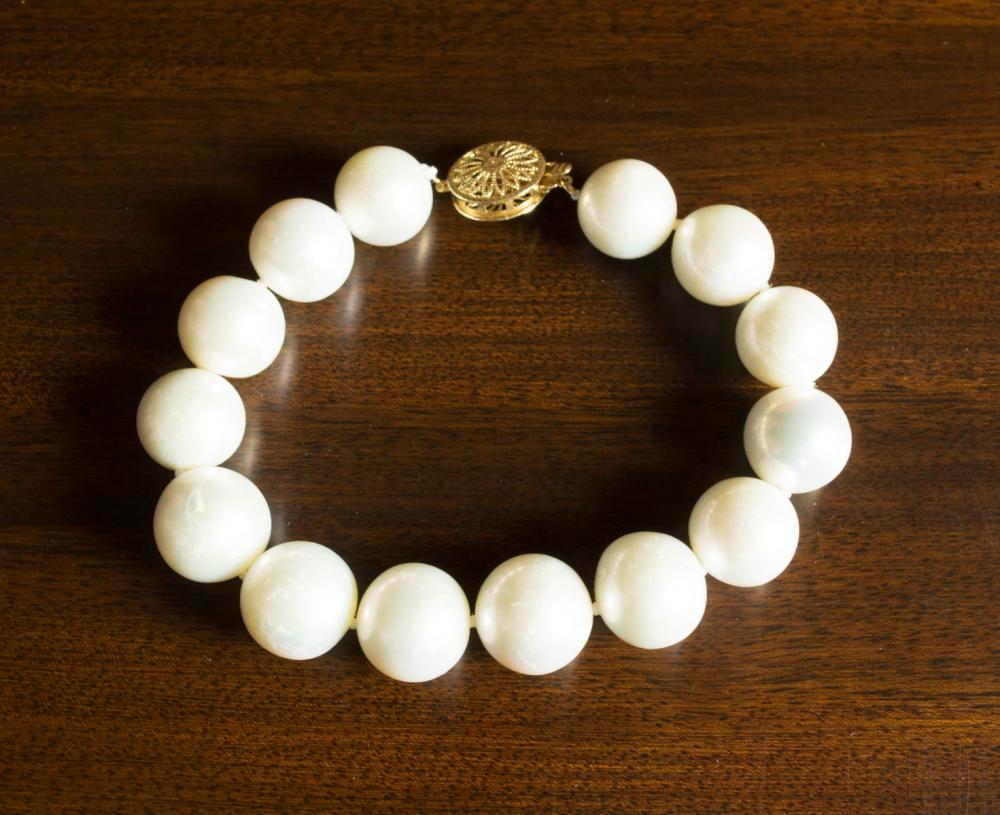 PEARL AND EIGHTEEN KARAT GOLD