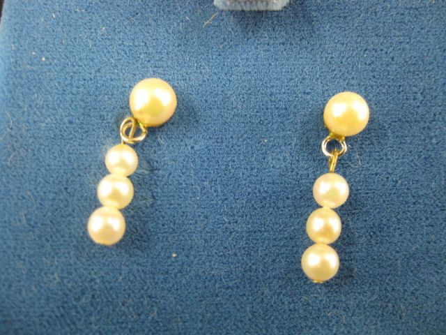 Pearl Earrings each with four