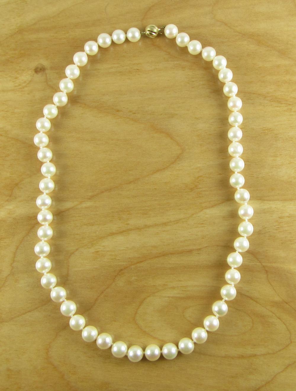 PEARL NECKLACE WITH APPRAISAL, AN