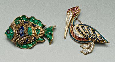Pelican, fish, gold brooches:
