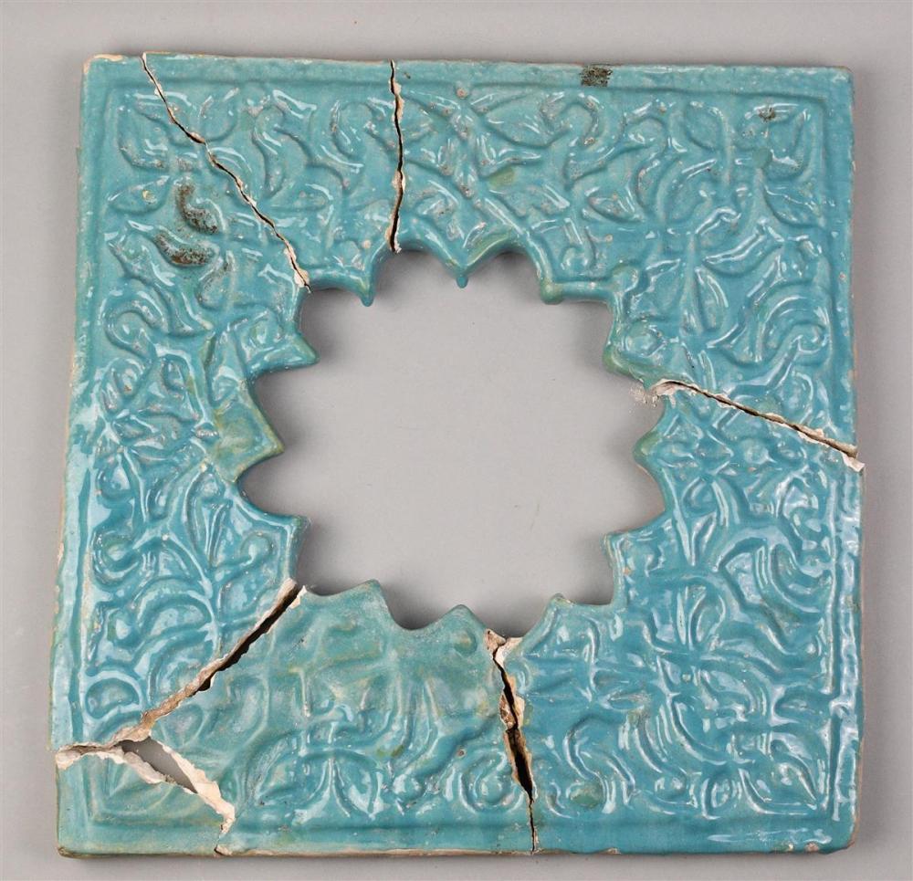 PERSIAN MOLDED AND TURQUOISE-GLAZED