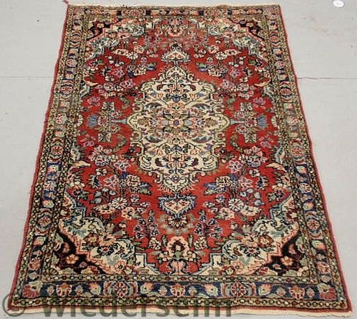 Persian oriental mat with a red