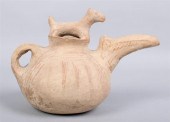PERSIAN POURING VESSEL WITH AN