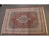 Persian roomsize carpet with b