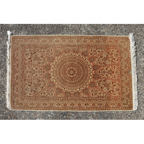 Persian silk rug of brown tones,