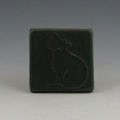 Pewabic cat tile in dark matte