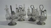 Pewter castor frame with bottl