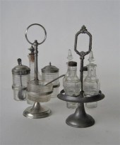 Pewter castor frame with bottl