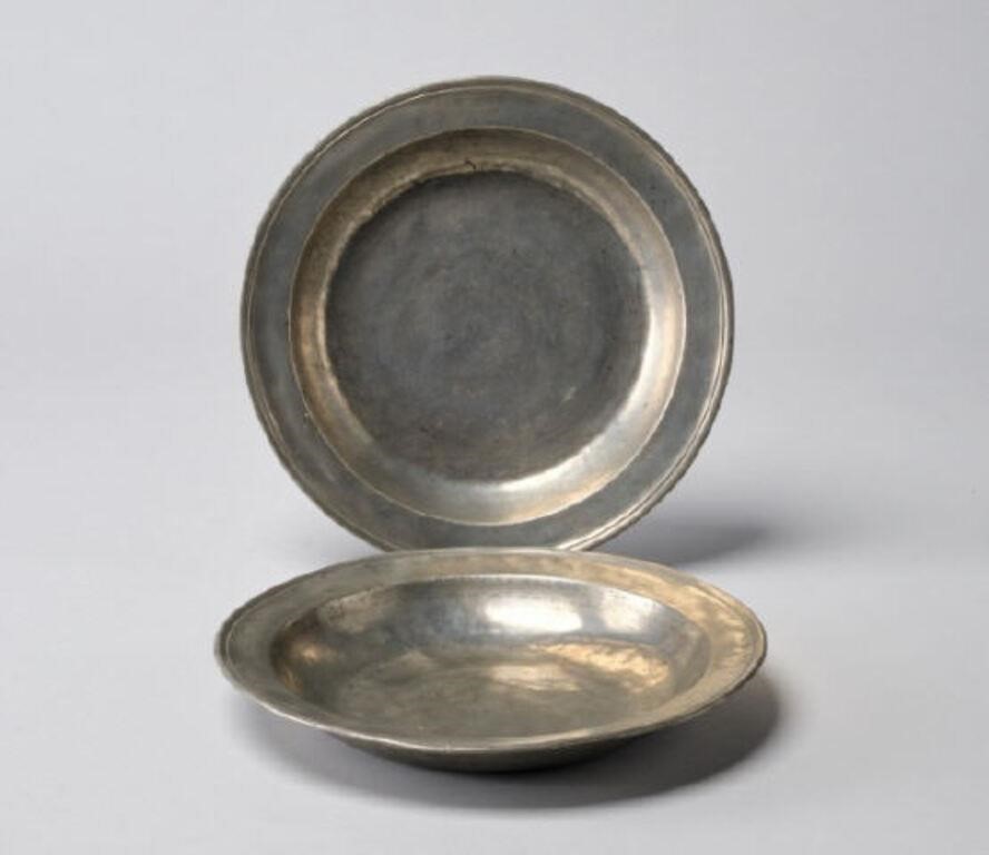 PEWTER CHARGERSA pair of antique