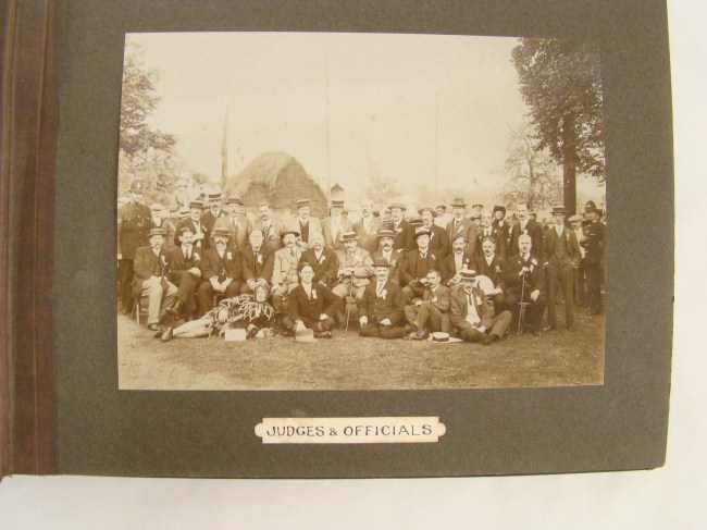 Photo Album with 13 photographs.