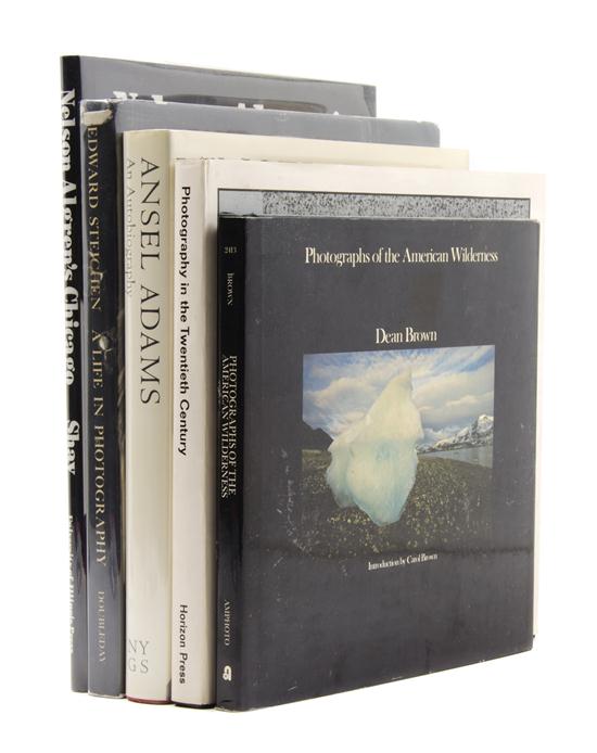 * (PHOTOGRAPHY) A group of 12 books