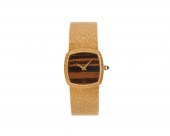 PIAGET 18K GOLD AND TIGER'S EY