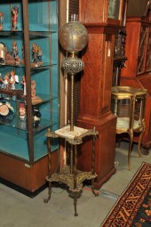 PIANO LAMP. Brass lamp having