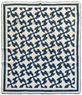 Pieced Drunkard's Path quilt,