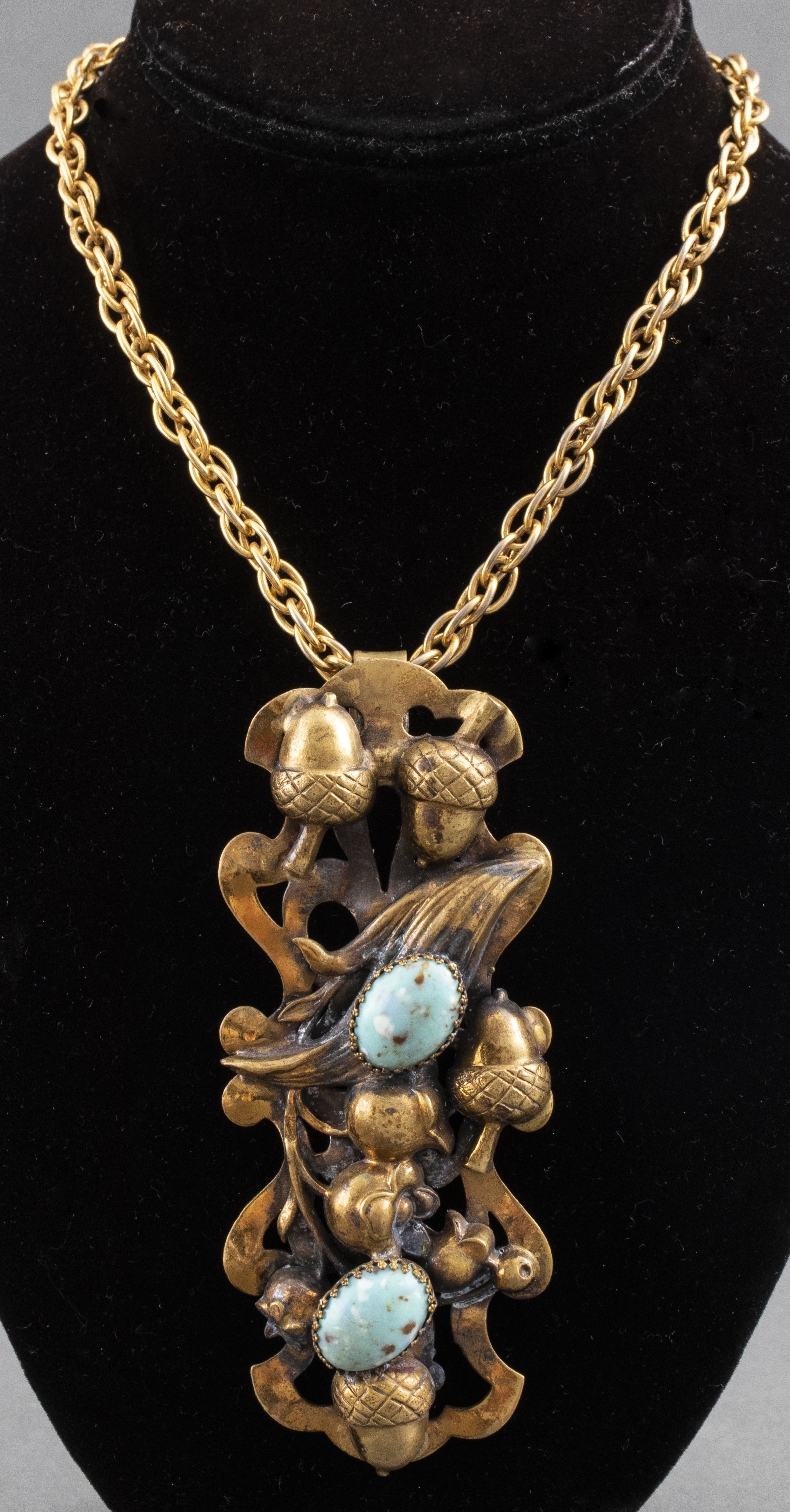 PIERCED BRASS AMULET PENDANT