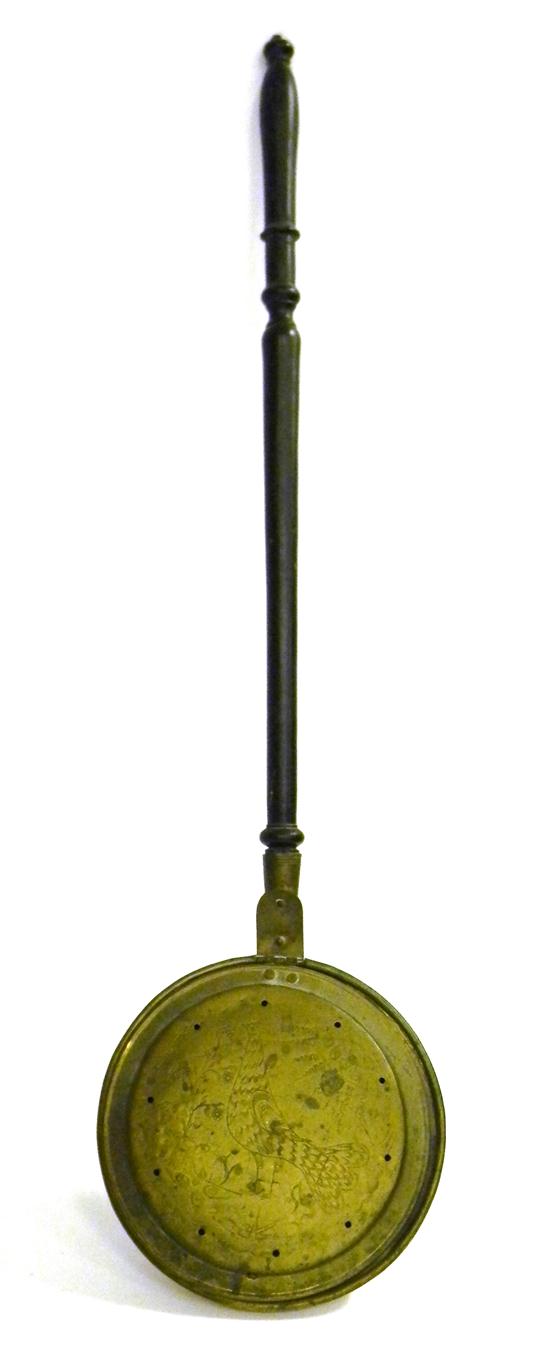Pierced brass bed warmer with