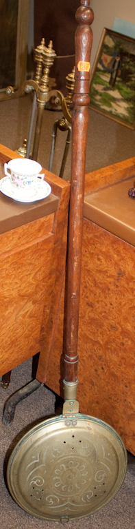 Pierced copper bed warmer with