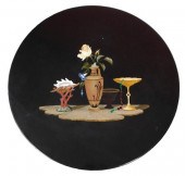 PIETRA DURA DISC RESTING ON RO
