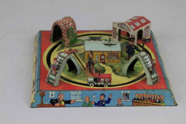 PINCHED WIND UP TOY Louis Marx
