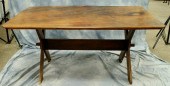 Pine sawbuck table with a late