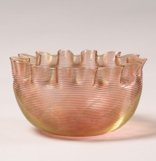 Pink art glass bowl with applied