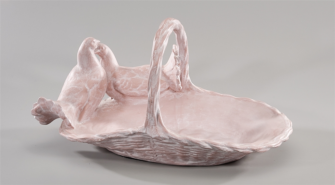 Pink glazed ceramic basket;
