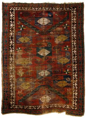Pinwheel Kazak rug, green and